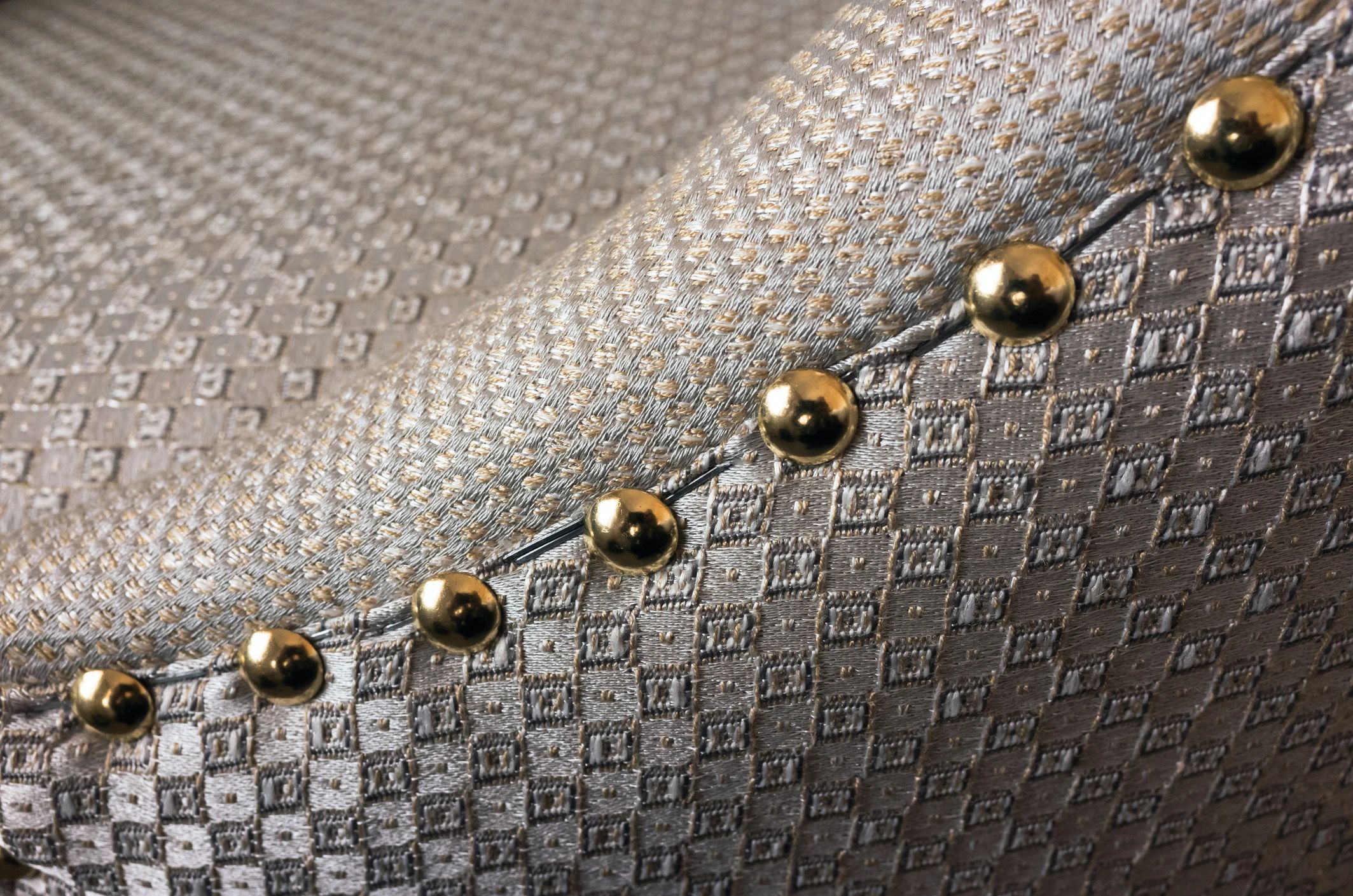 Close-up detail of upholstered chair craftsmanship