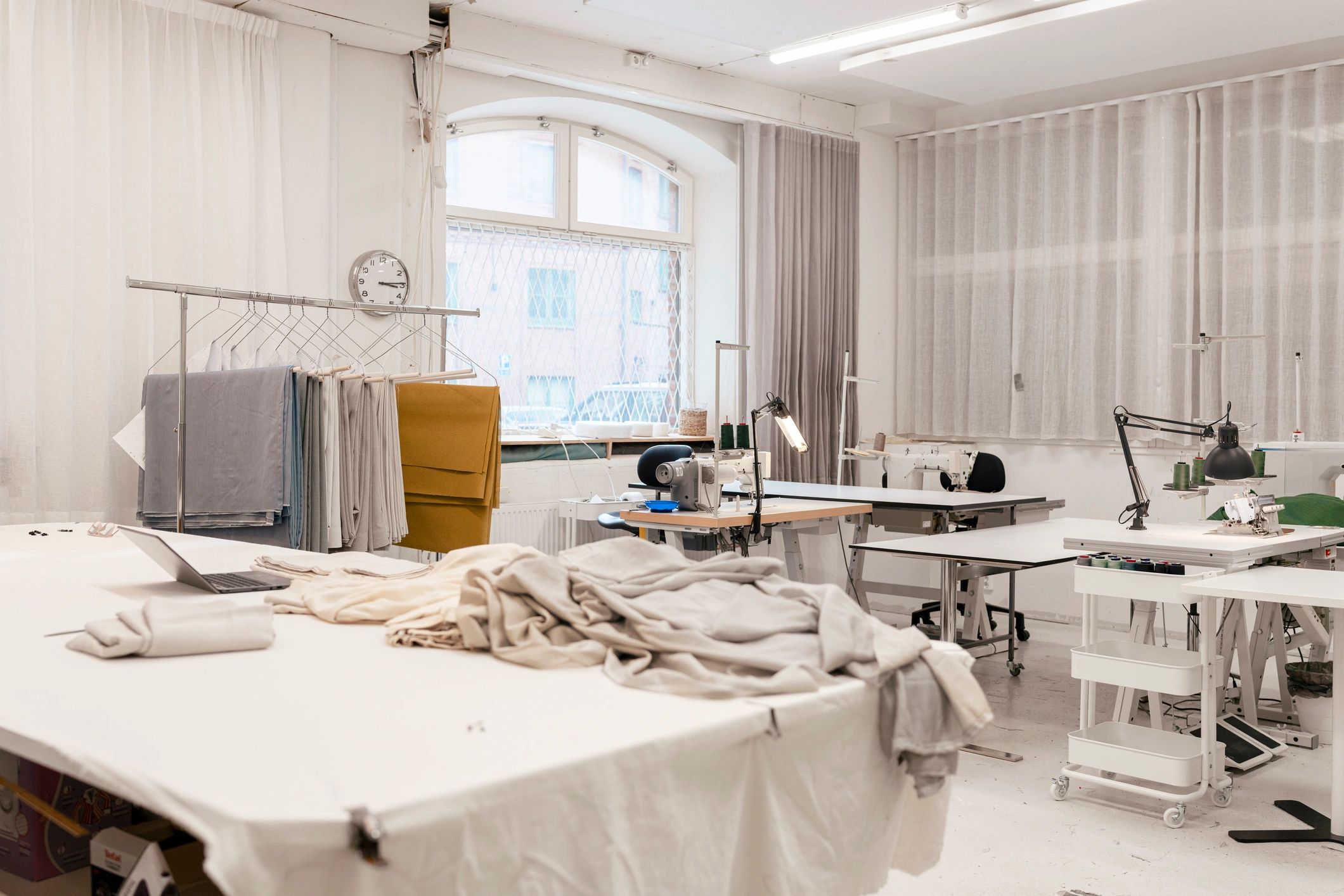 Upholstery workshop with fabric and sewing equipment